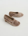 Astrakan Heel, Biscuit