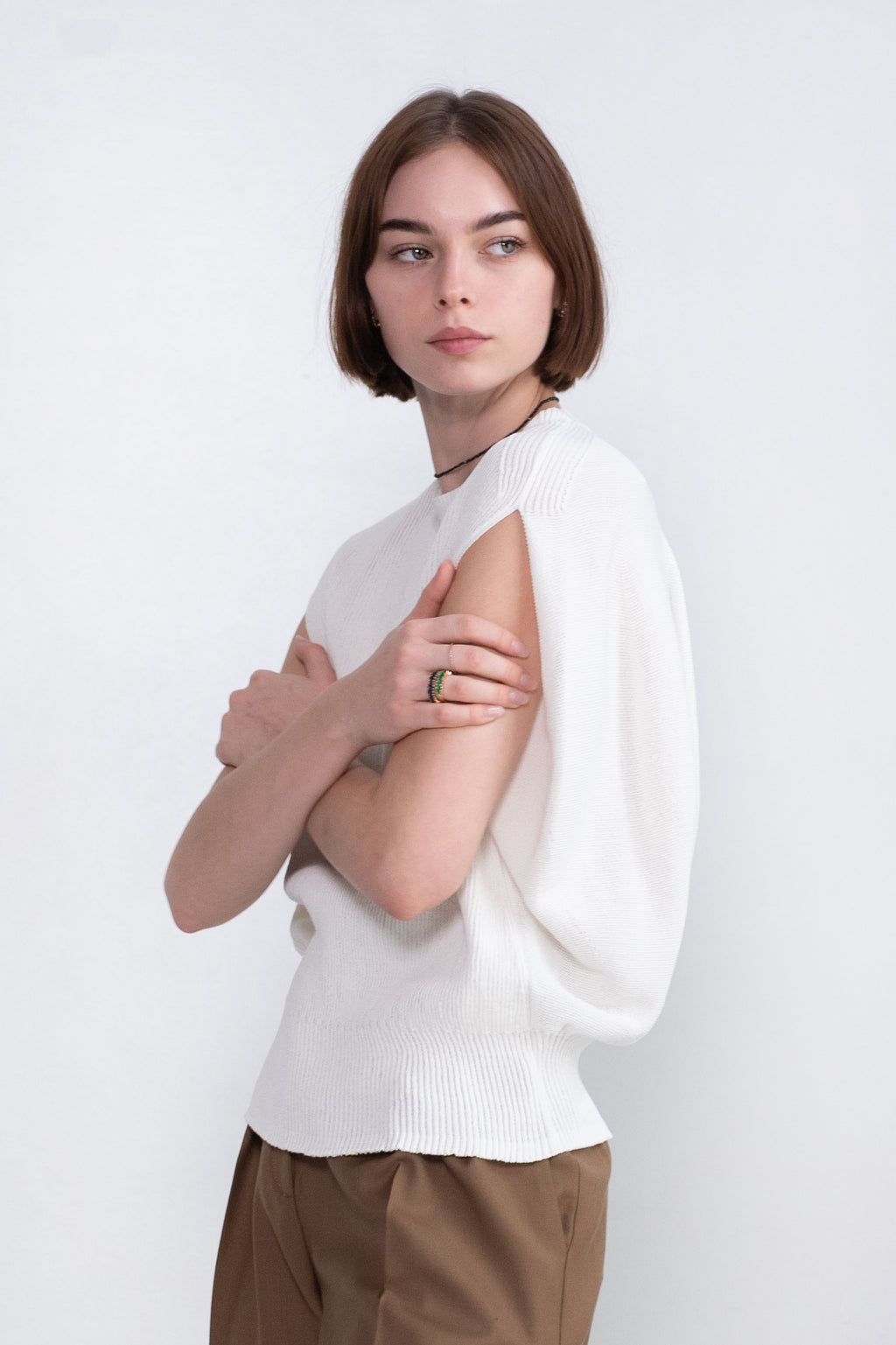 Akira Naka Gema Knit Top, White Kick Pleat