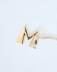 MARLA AARON - Letter "M", yellow gold
