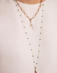 JOANNA DAHDAH - SMALL BIRD PENDANT, yellow gold with brown diamonds