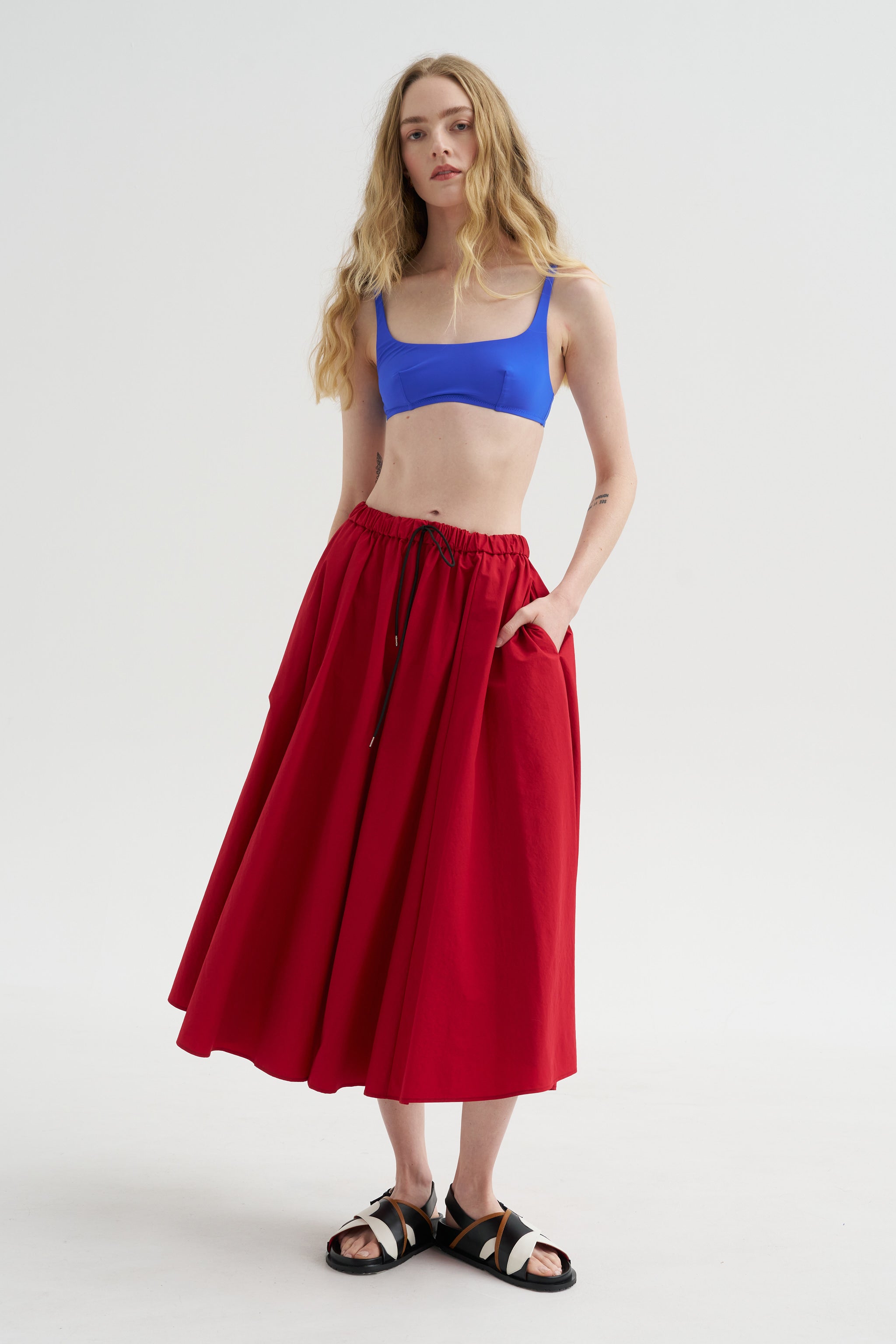 Technical Skirt, Red – Kick Pleat