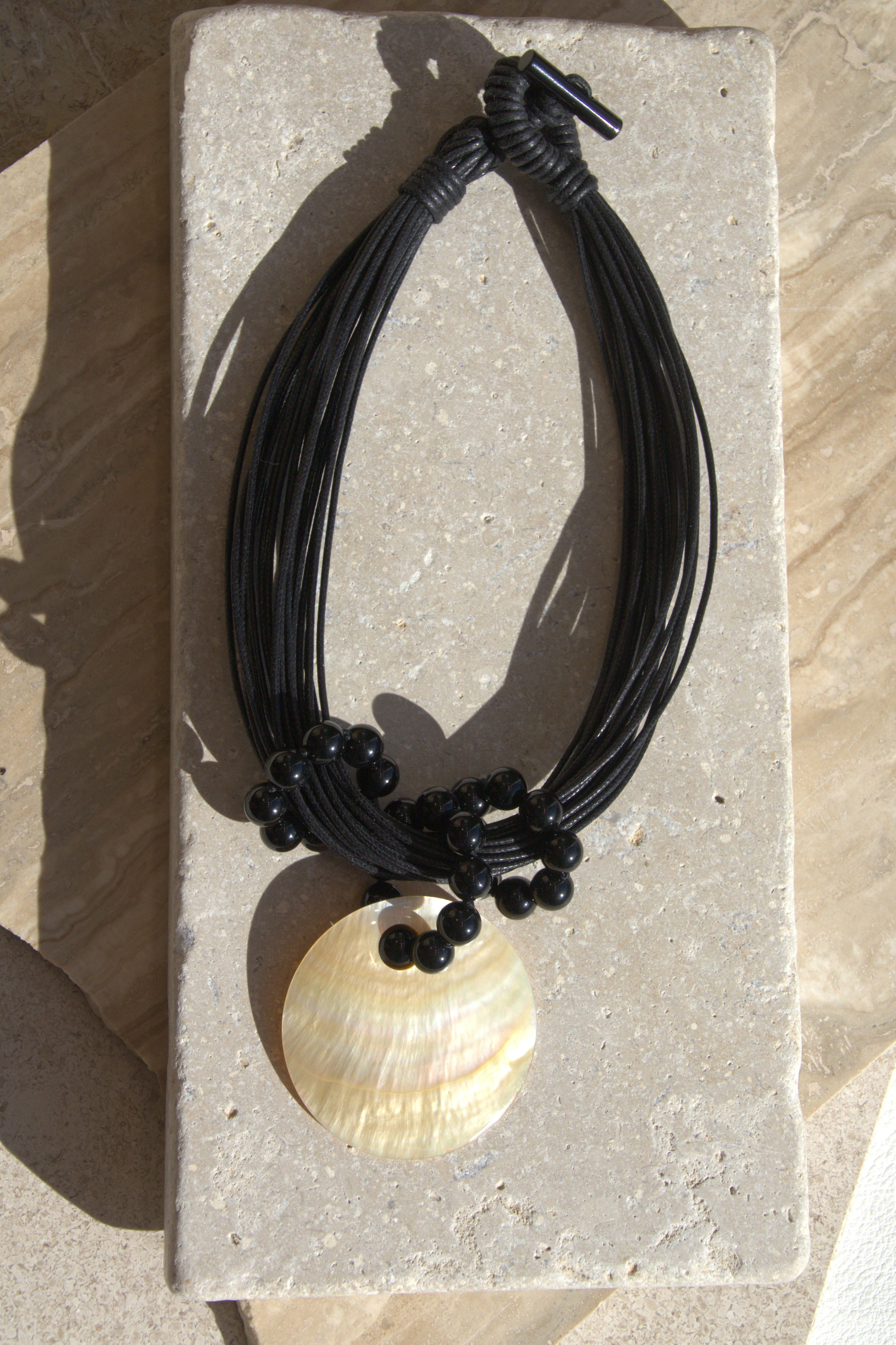 Ivory Eclipse Pendant, Black