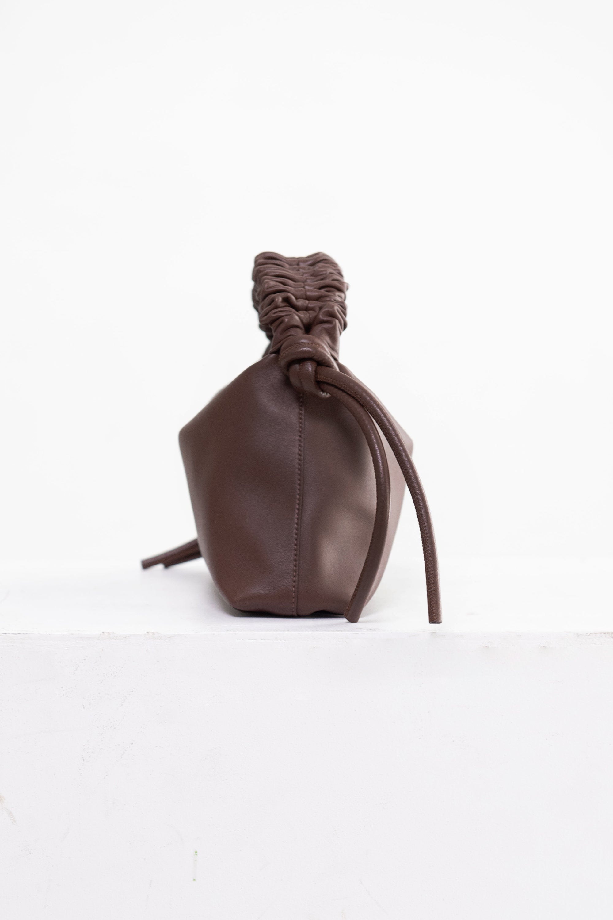 Proenza Mini Drawstring Bag Mocha Kick Pleat
